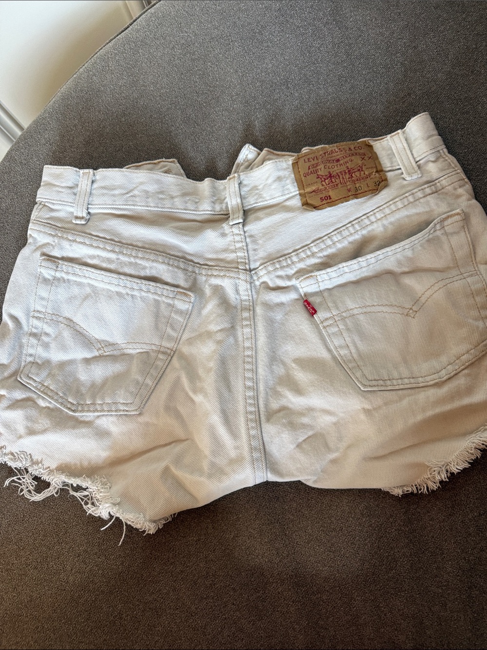 Levi's White Denim Frayed Hem Cutoff Shorts
